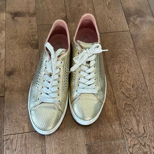 Tods gold sneakers